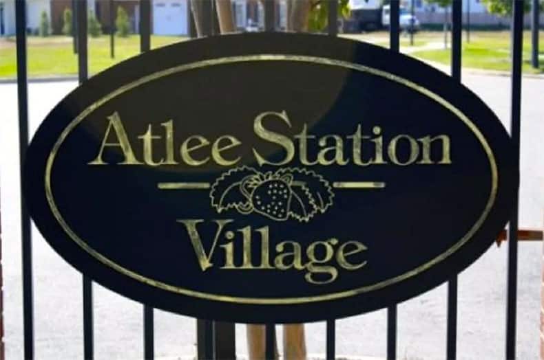 A sign that reads Atlee Station Village