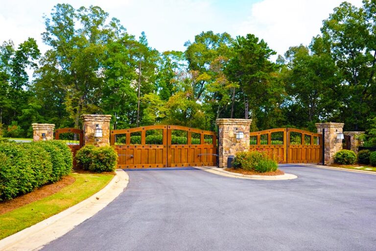 Ornate wooden and stone gates at a 55+ retirement community near Philadelphia, Pennsylvania.