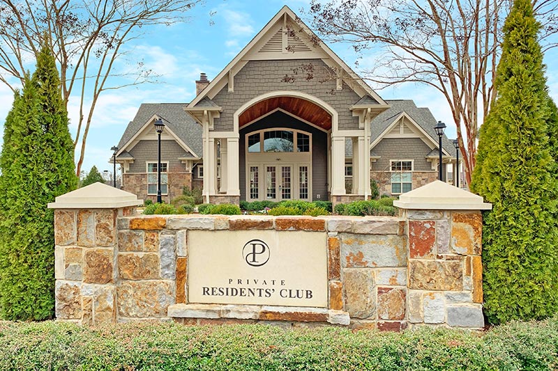 The welcome sign at the entrance of Highcliff at Palisades - The Gardens, a 55+ community in Charlotte, North Carolina.