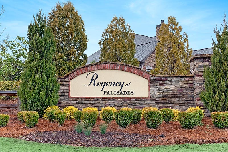 The welcome sign at the entrance of Regency at Palisades, a 55+ community in Charlotte, North Carolina.