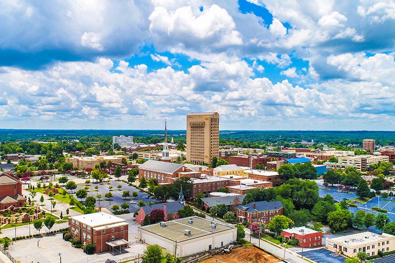 Aerial view of the Downtown Spartanburg skyline in South Carolina on a sunny day.