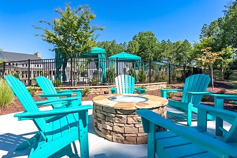 Chairs surrounding a fire pit at Encore at Briar Chapel in Chapel Hill, North Carolina.