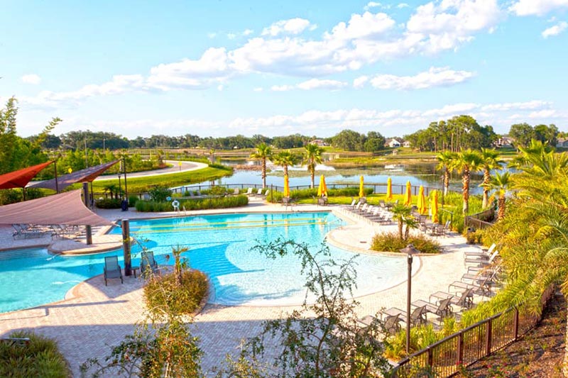 Aerial view of the outdoor pool at Del Webb Orlando, a 55+ community in Davenport, Florida.