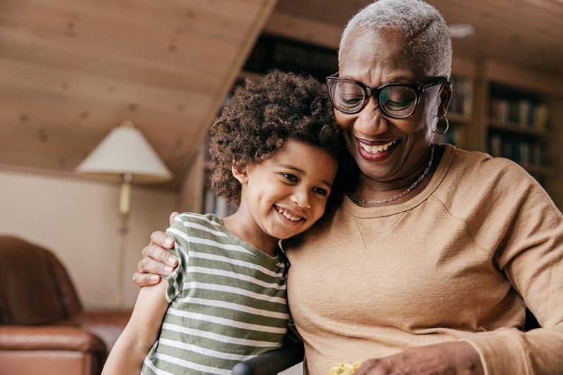 A granddaughter lives with her grandmother in a 55+community.