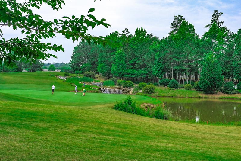 Retirees golfing at Sun City Peachtree in Griffin, Georgia