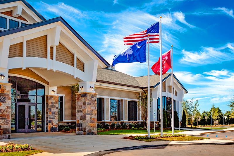 Flags flying outside the clubhouse at Sun City Carolina Lakes, a 55+ community in Indian Land, South Carolina.
