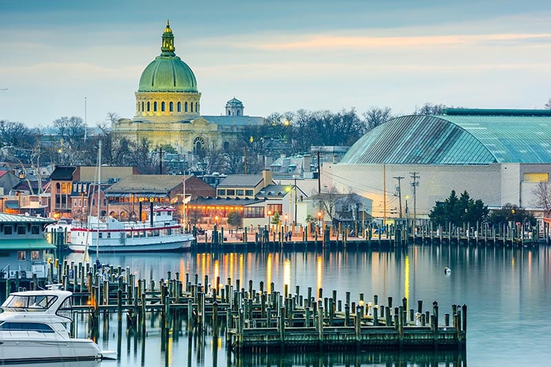 Annapolis, MD skyline from Chesapeake Bay with the United States Naval Academy Chapel dome in the background.