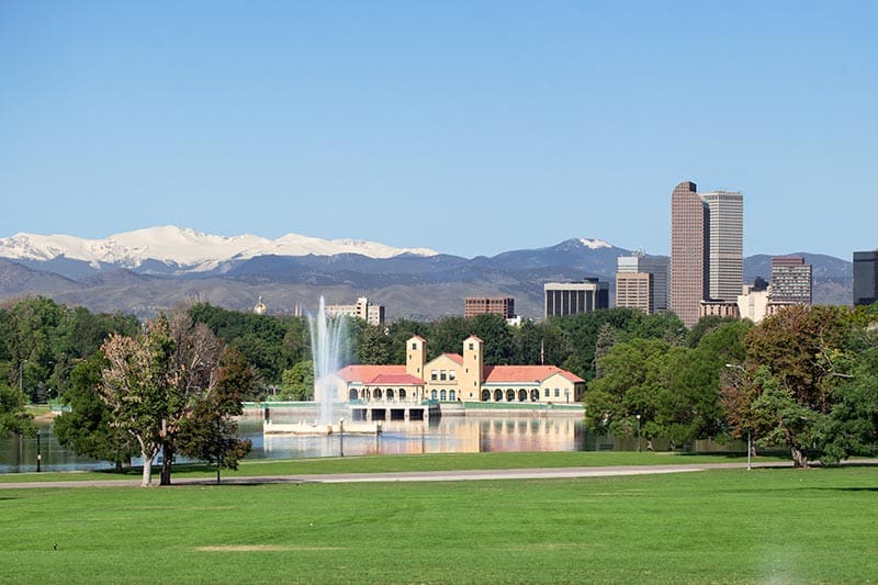 Denver's City Park with snow capped Rocky Mountains in the background.