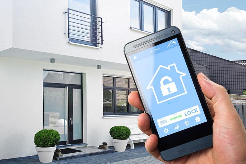 Phone showing electronic door lock confirmation for house.