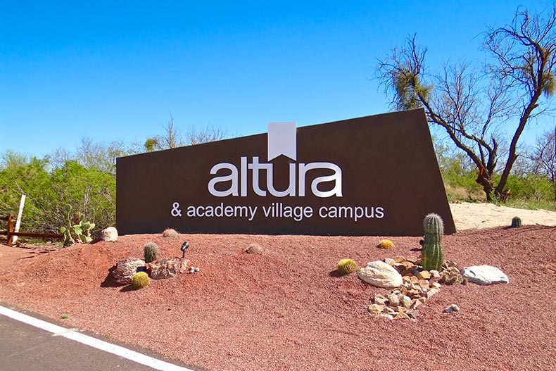 Desert landscape surrounding the community sign for Altura in Tucson, Arizona.