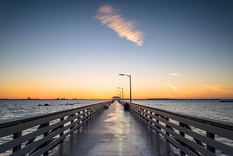 Sunset view down the pier at Ballast Point in Tampa, Florida.