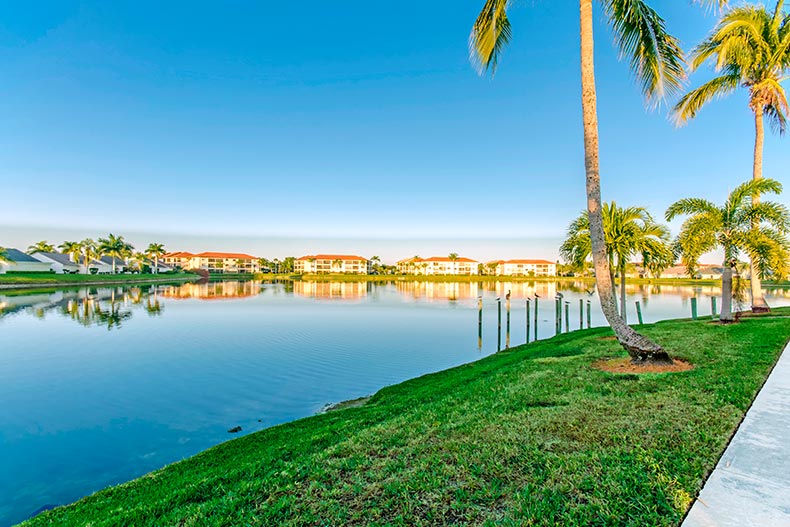 View across the water of residential buildings at Cinnamon Cove in Fort Myers, Florida.