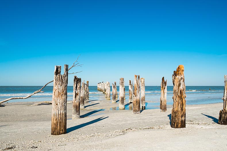 A rustic decaying pier along Fort Myers Beach on the west coast of Florida.