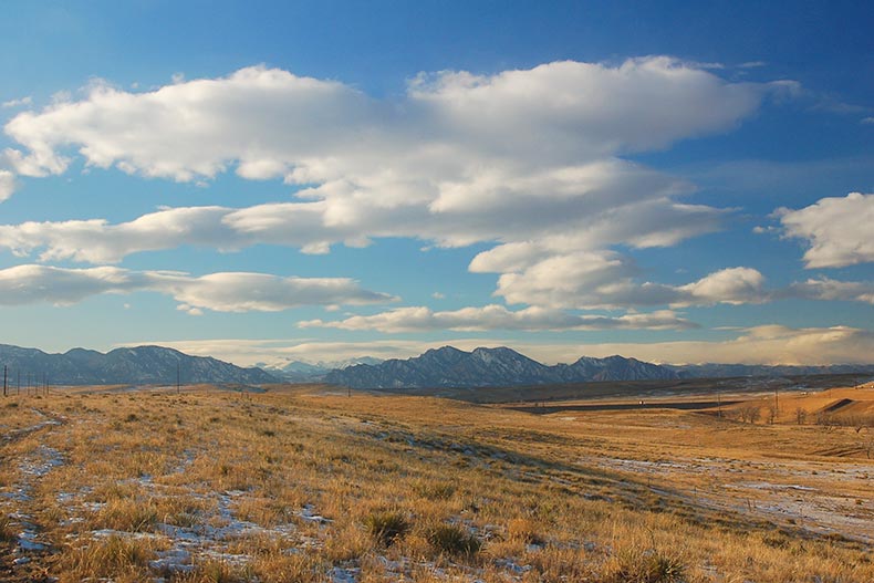 View of the Rocky Mountain Front Range Boulder Flatirons and open space from Westminster and Broomfield, Colorado.