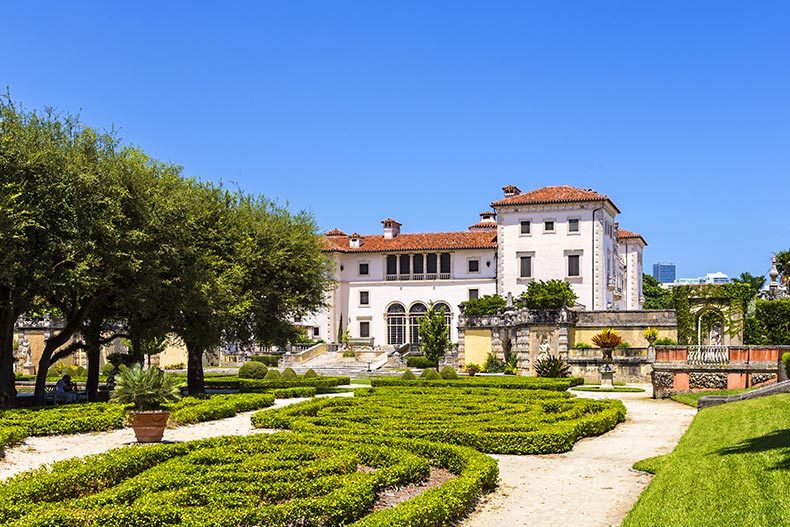 Exterior view of The Vizcaya Museum in Miami on a sunny day.