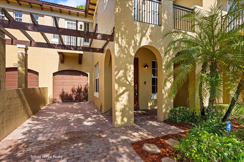 Exterior view of attached homes at Emerald Dunes in West Palm Beach, Florida.