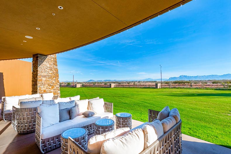 Patio furniture on the grounds of Encore at Eastmark in Mesa, Arizona on a sunny day.