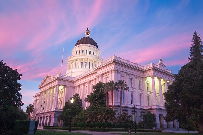 The State Capitol of California in Sacramento at sunset.