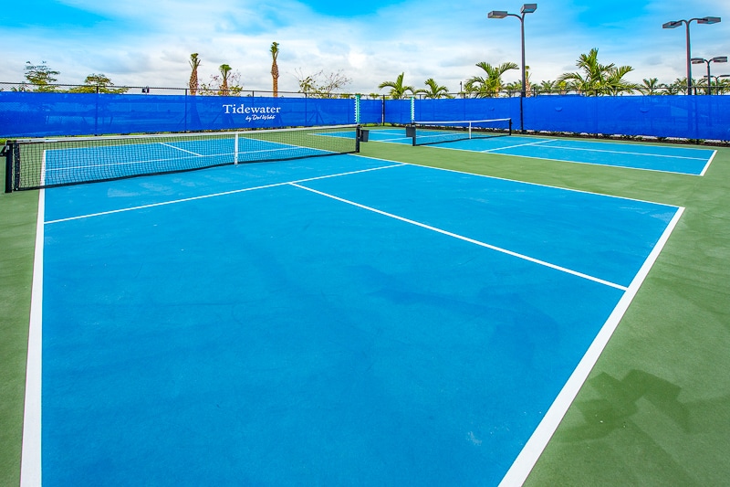 A tennis court at Tidewater by Del Webb in Estero, Florida