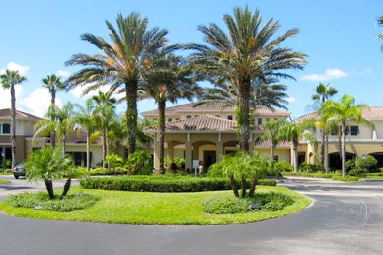 Palm trees surrounding the entrance to Kings Point in Sun City Center, Florida.