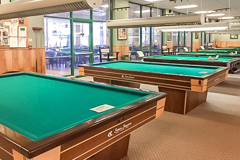 Pool tables in a community building at Wynmoor Village in Coconut Creek, Florida.