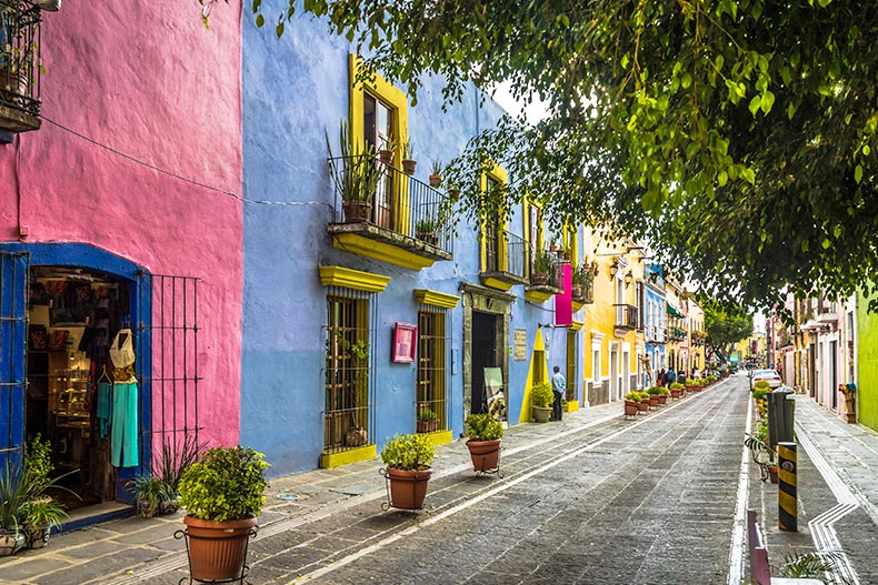 View of colorful buildings along Callejon de los Sapos in Puebla, Mexico.