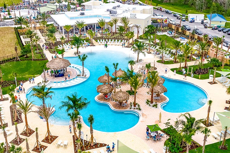 Aerial view of an outdoor resort-style pool at Latitude Margaritaville in Daytona Beach, Florida.