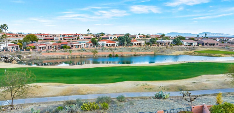Golf course with community in background