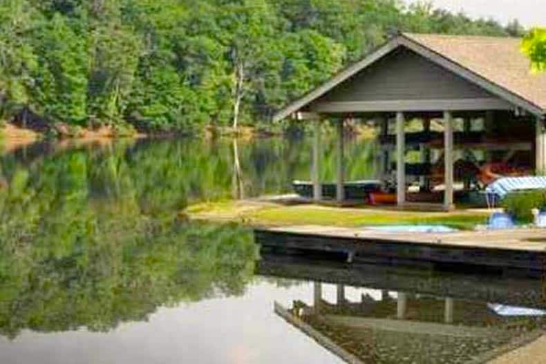 A boat house on a lake at Biltmore Lake in Asheville, North Carolina.