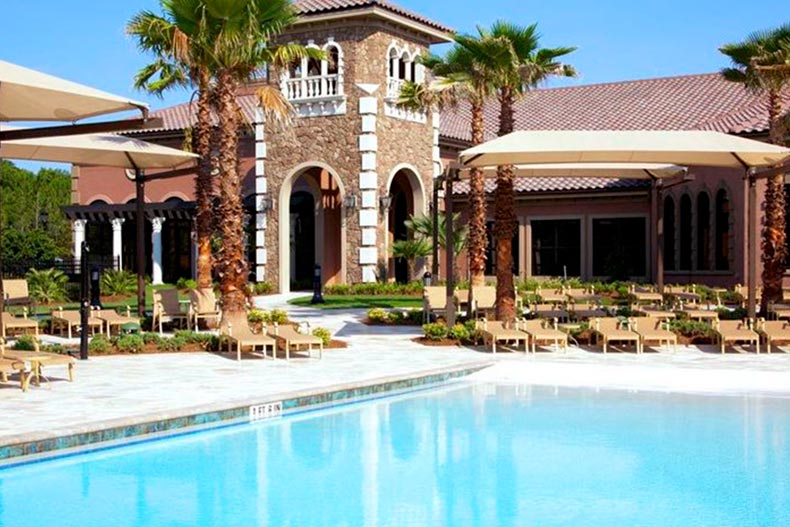 Lounge chairs beside the outdoor pool at Del Webb Ponte Vedra in Ponte Vedra, Florida.