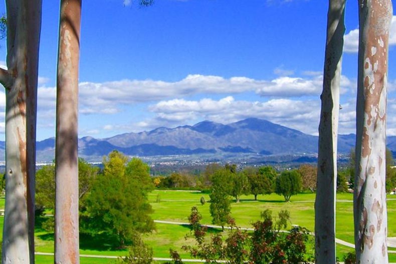 Mountains surrounding the green grounds of Laguna Woods Village in Laguna Woods, California.