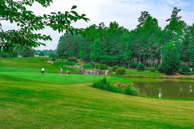 Residents on the golf course at Sun City Peachtree in Griffin, Georgia.