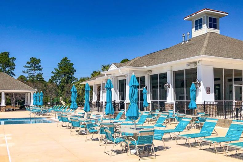 Lounge chairs beside the outdoor pool at Berkshire Forest in Myrtle Beach, South Carolina.