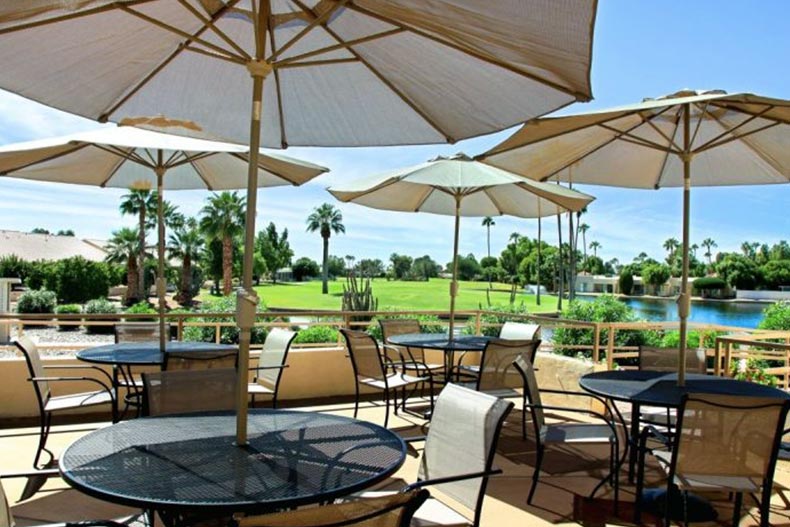 Chairs and tables on the outdoor patio at Fountain of the Sun in Mesa, Arizona.