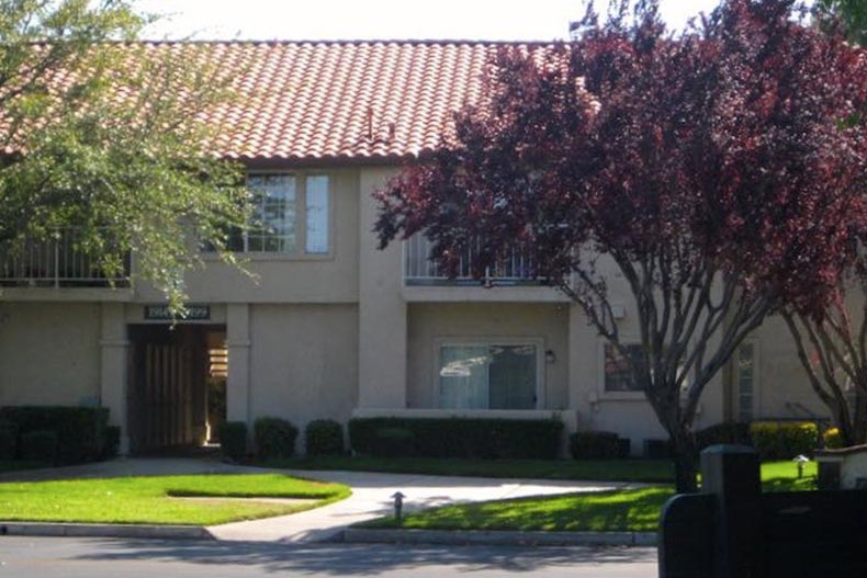 Exterior view of a condo building at Jess Ranch in Apple Valley, California.