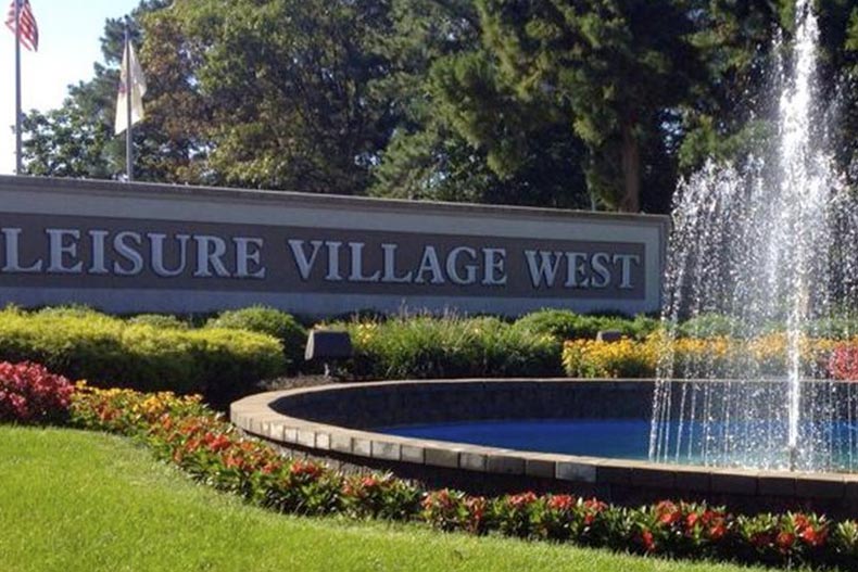 A fountain beside the community sign for Leisure Village West in Manchester, New Jersey.