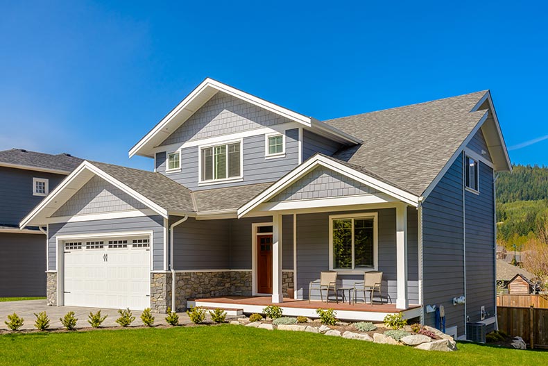 Exterior view of a new house in North America during the summer.