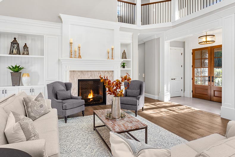 Interior view of a large single-family home with a bright living room.