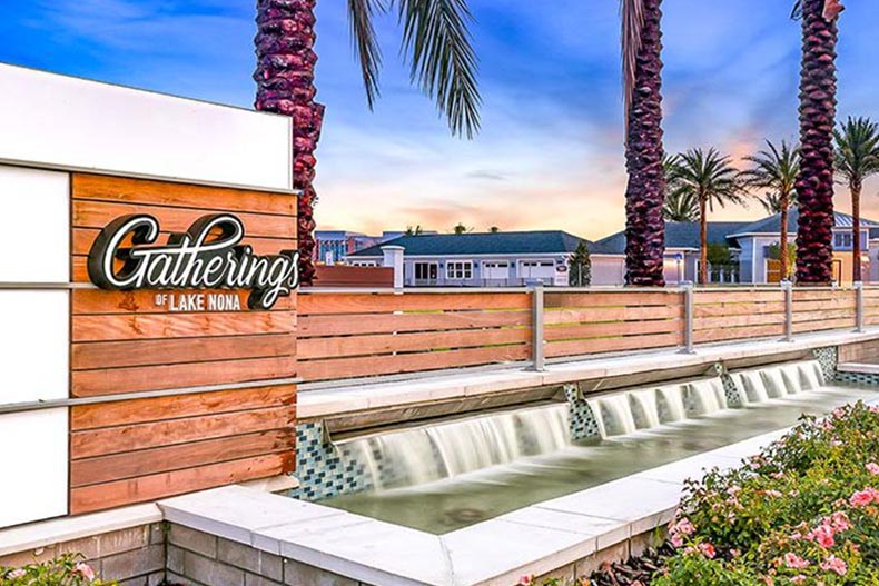 A water feature beside the community sign for Gatherings of Lake Nona in Orlando, Florida.