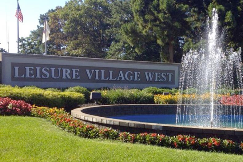 A fountain beside the community sign for Leisure Village West in Manchester, New Jersey.