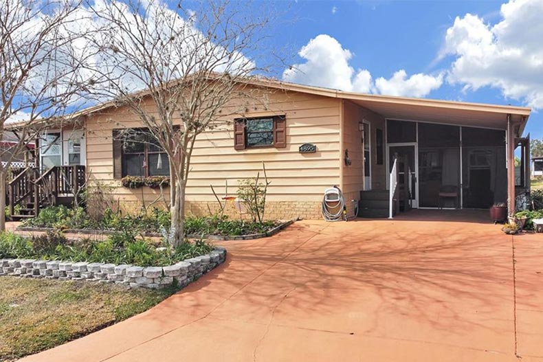 Exterior view of a home at Foxwood Lakes Estates in Lakeland, Florida.