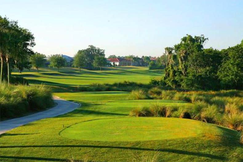 A golf course surrounded by trees on the grounds of Sun City Center near Tampa, Florida.