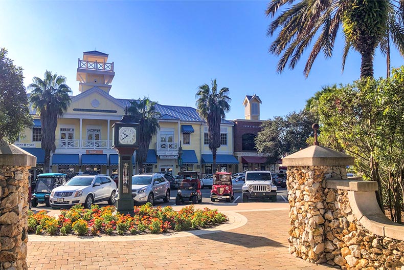 Cars parked in a town square in The Villages in Florida.