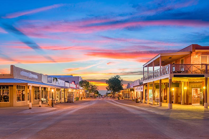 View down the street of Tombstone, Arizona at sunset.