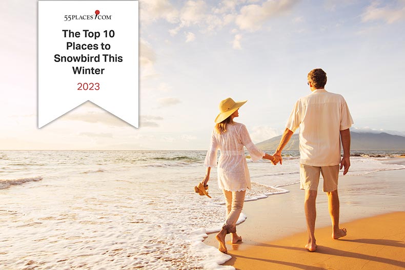 Happy 55+ couple on a beach enjoying a snowbird lifestyle with 55places banner.
