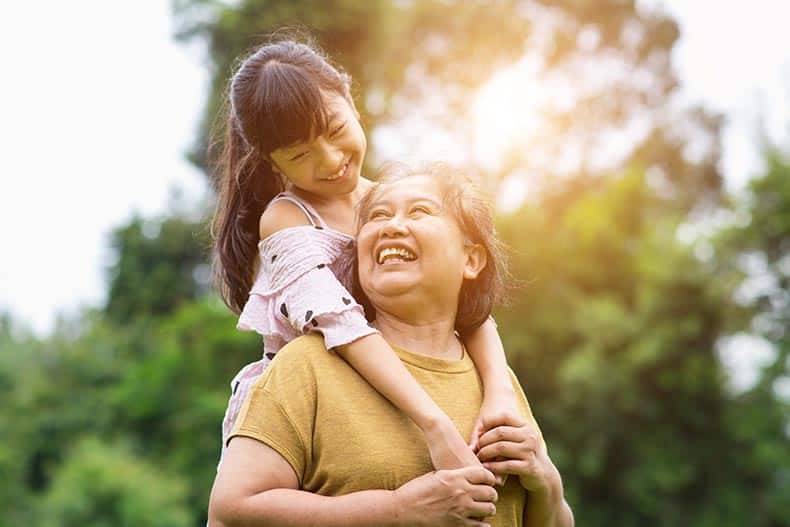 Grandmother and granddaughter enjoying a sunny day.