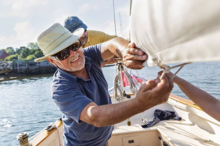 A retiree prepares his boat at his 55+ community that caters to boat enthusiasts.