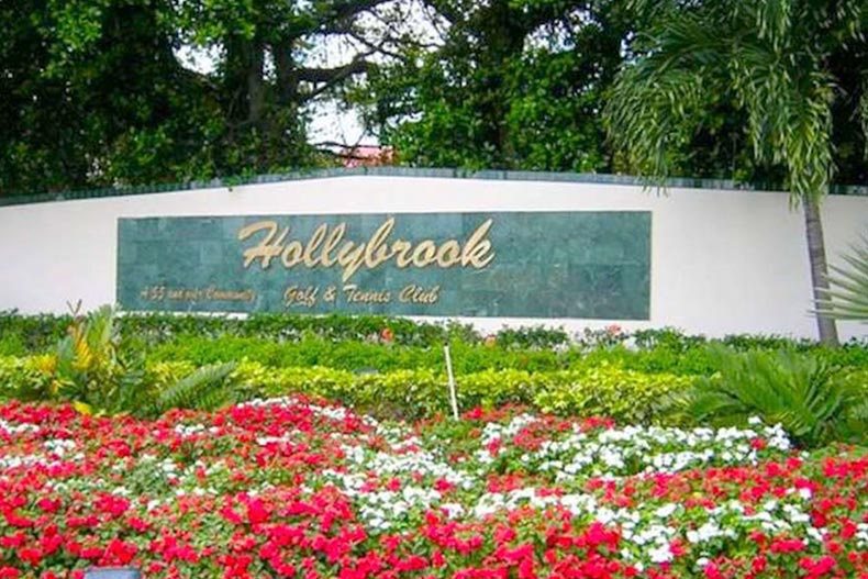 The community sign for Hollybrook Golf and Tennis Club in Pembroke Pines, Florida.