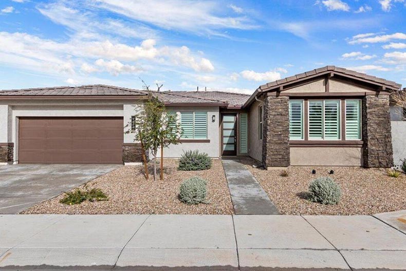 Exterior view of a home in Ovation at Meridian in Queen Creek, Arizona.