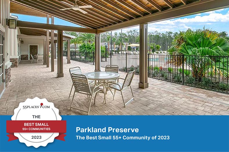 An outdoor patio at Parkland Preserve in St. Augustine, Florida with an award banner.